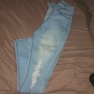 Light wash Distressed High rise skinny jeans